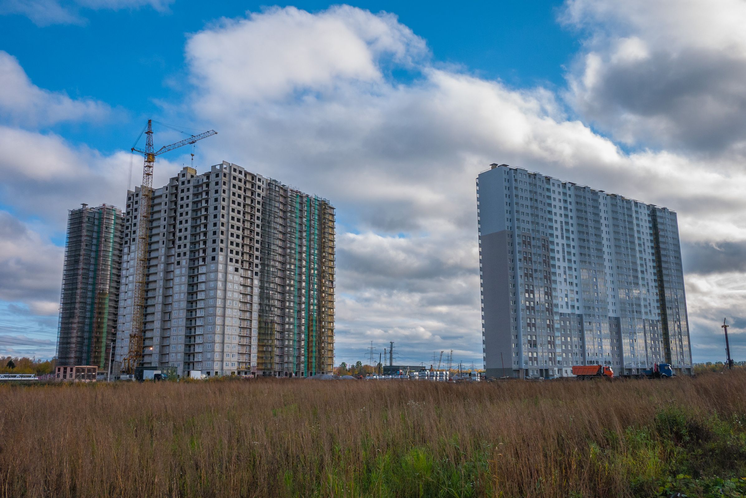 Residential towers under construction with cranes