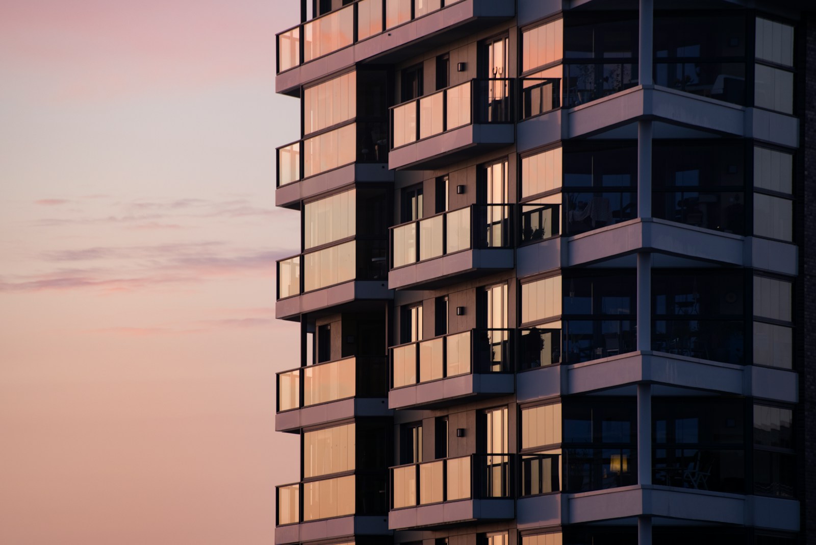 Contemporary residential building with a white facade